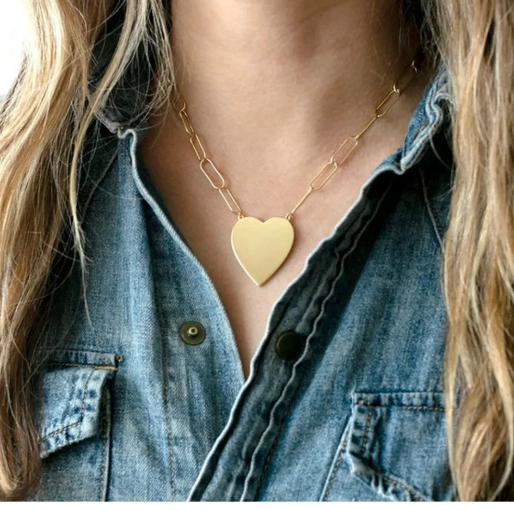 Gold heart on paperclip necklace